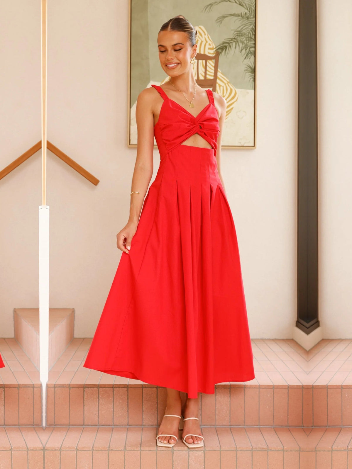 Red a-line maxi formal dress with V-neckline, full-length front view