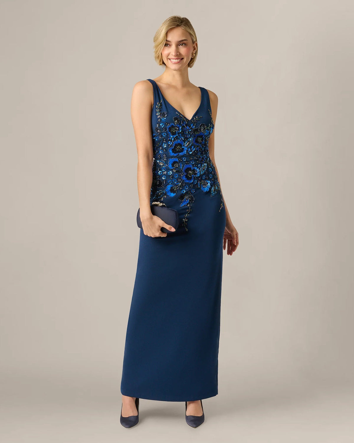 Light navy blue sleeveless maxi dress with V-neck and blue floral sequin bodice