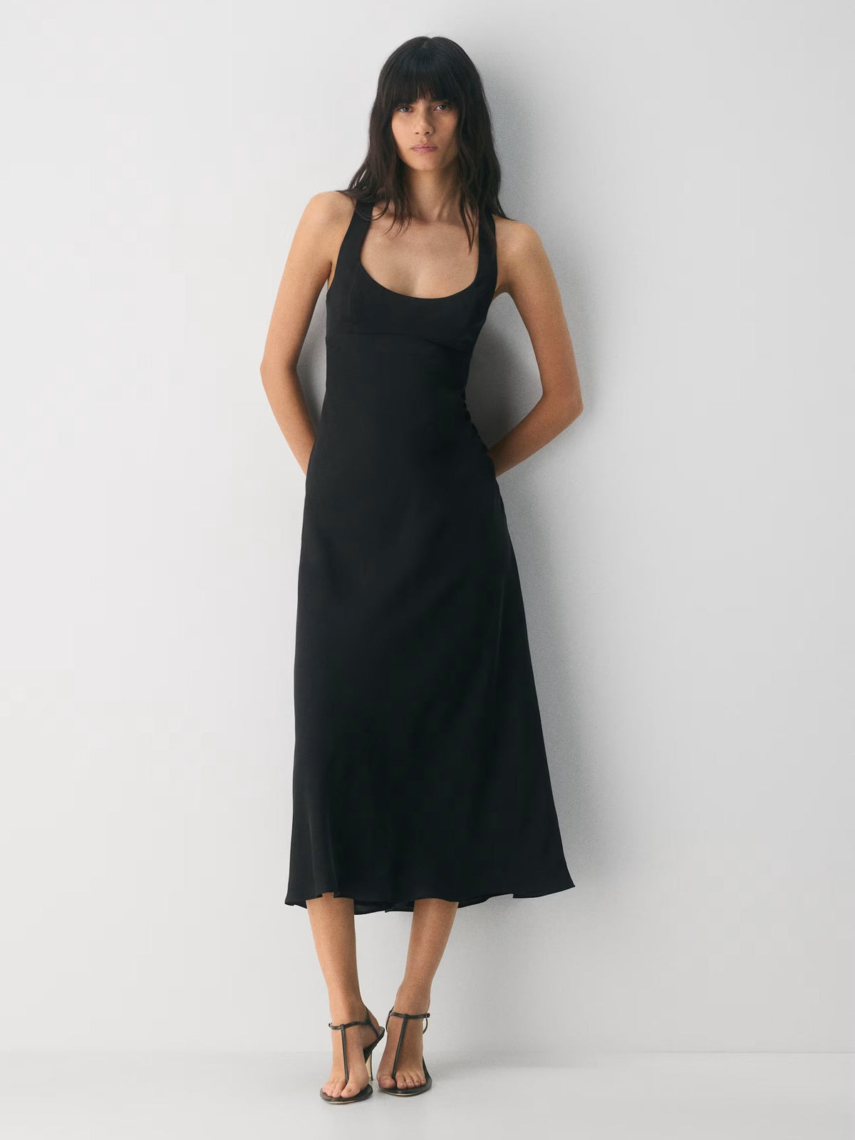 Black maxi formal dress, front full-length view showing the neckline