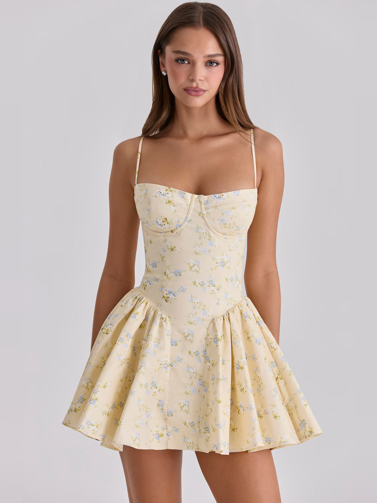 Corset-style mini homecoming dress with spaghetti straps, sweetheart neckline, floral print