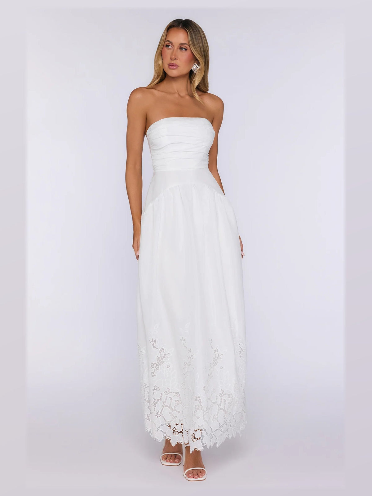 White formal dress with a-line silhouette and maxi length