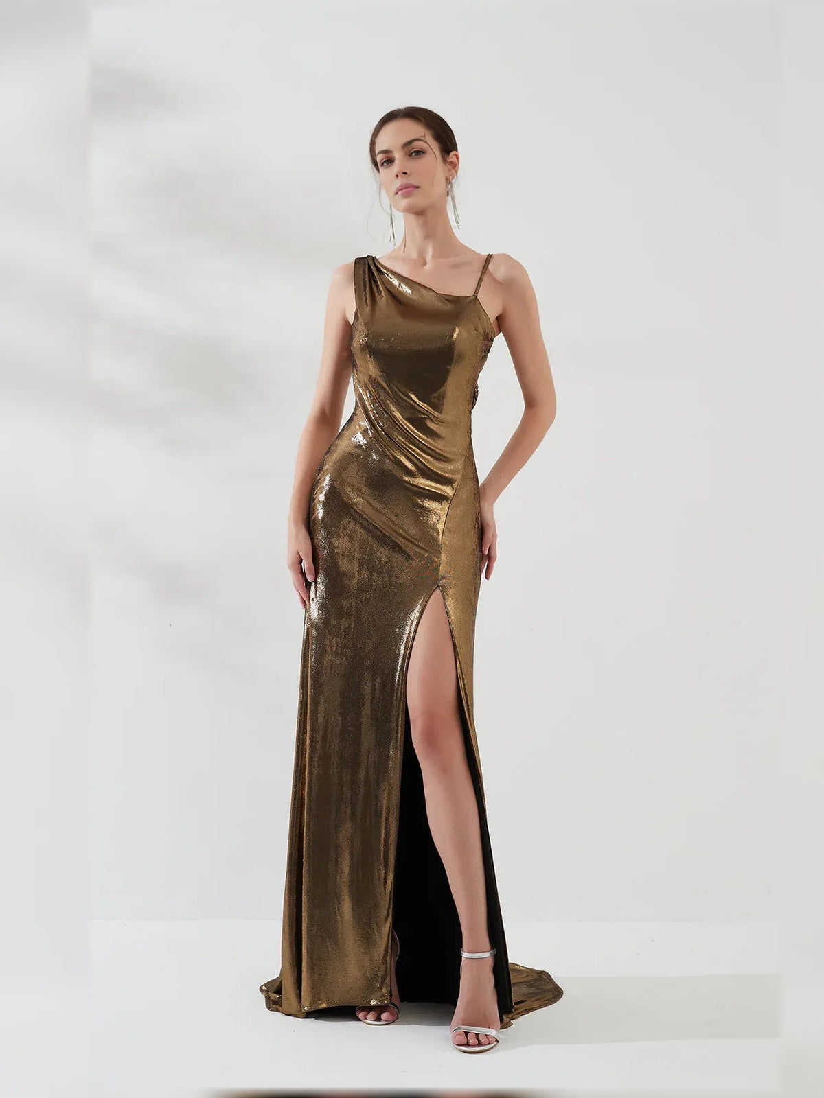 Gold one-shoulder satin mermaid gown with high side slit and draped bodice