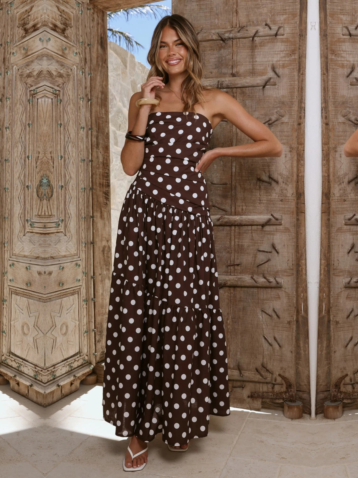 Brown White Polka Dot a-line maxi formal dress with strapless neckline, full-length front view