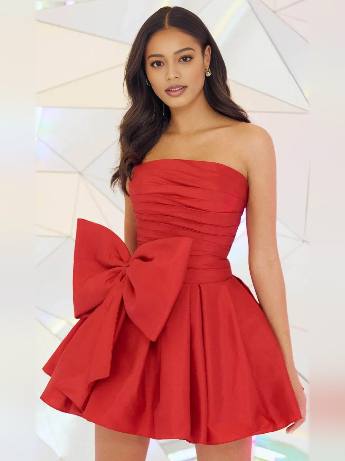 Red ruched satin strapless A-line mini dress with oversized bow detail