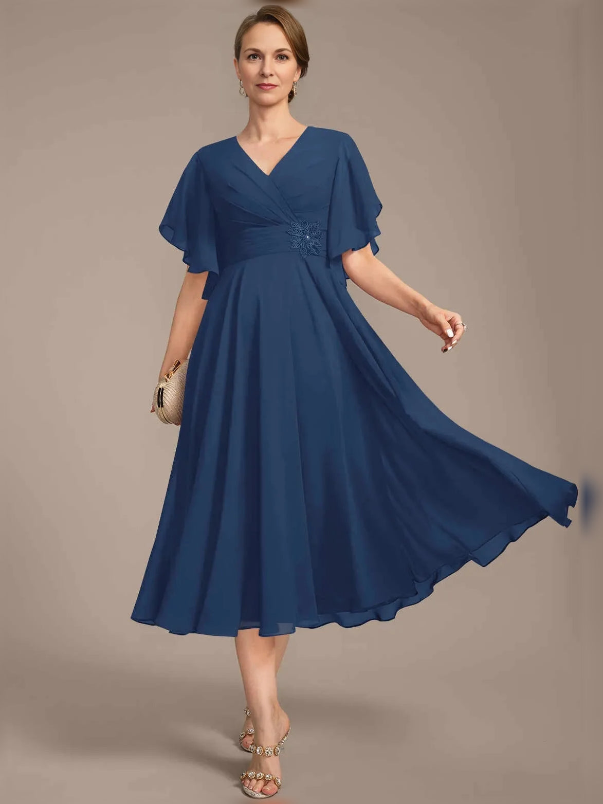 V-neck A-line chiffon dress with draped bodice, pleated skirt, flutter sleeves, blue