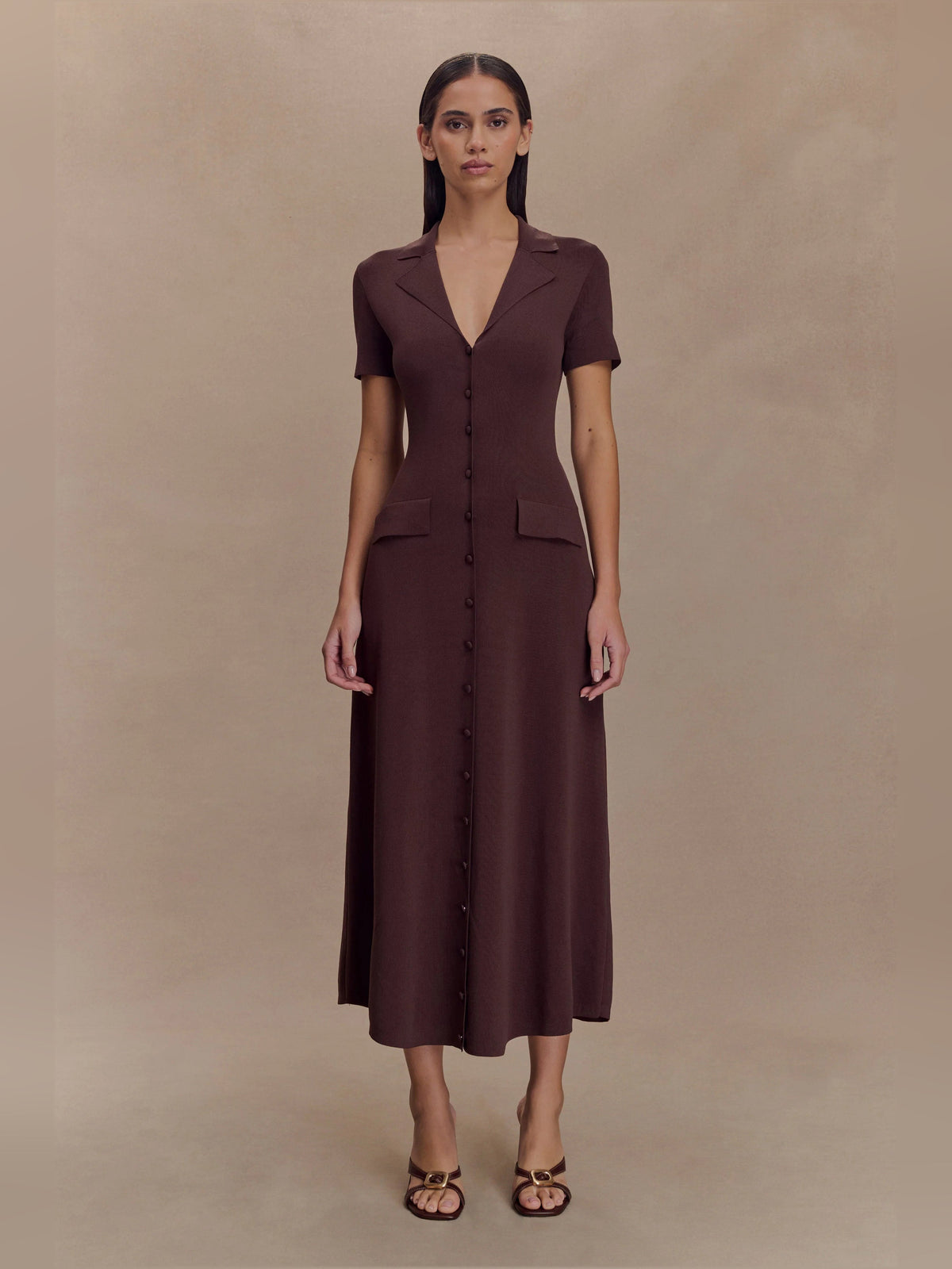 Chocolate-brown short-sleeve knit midi dress with V-neck, button front, and patch pockets