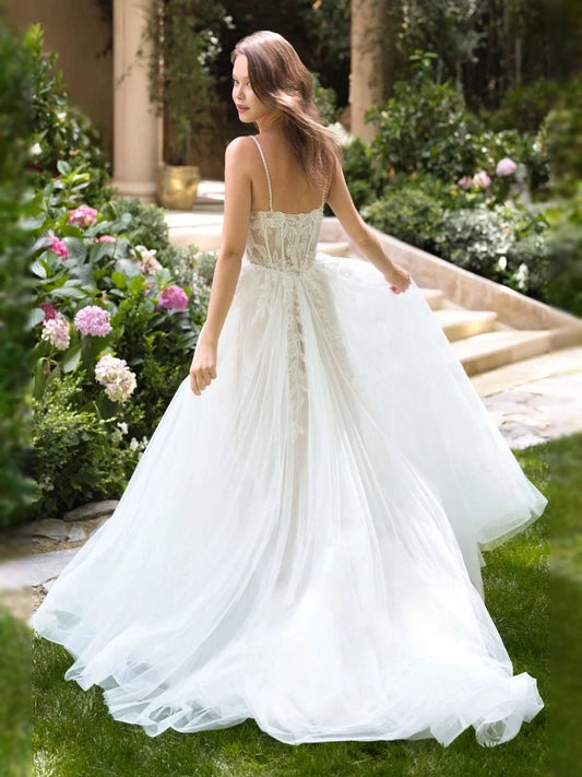 Ivory lace corset wedding dress with layered tulle A-line skirt, V-neck, thin straps