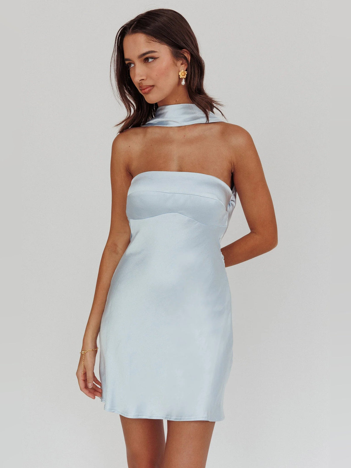 Light blue halter-neck mini dress with smooth fitted bodice and short skirt
