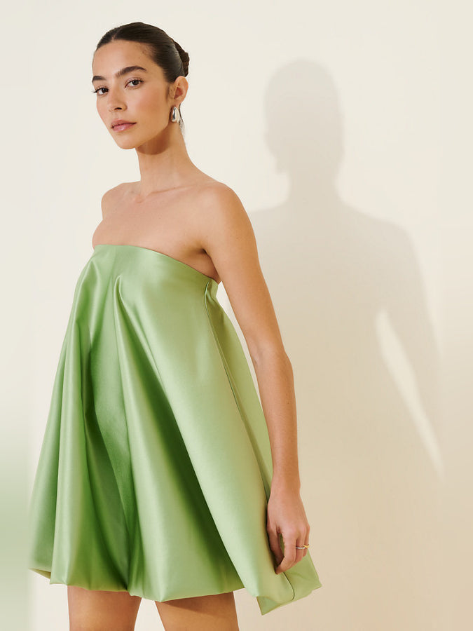 Lime green strapless mini dress with gathered bodice and flared skirt