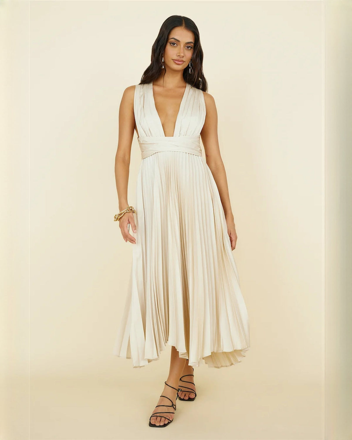 Ivory sleeveless V-neck chiffon A-line midi dress with pleated skirt and waist ruching