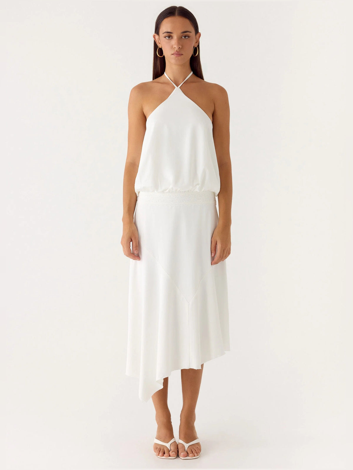 White midi formal dress with halter neckline, draped bodice, asymmetrical hem
