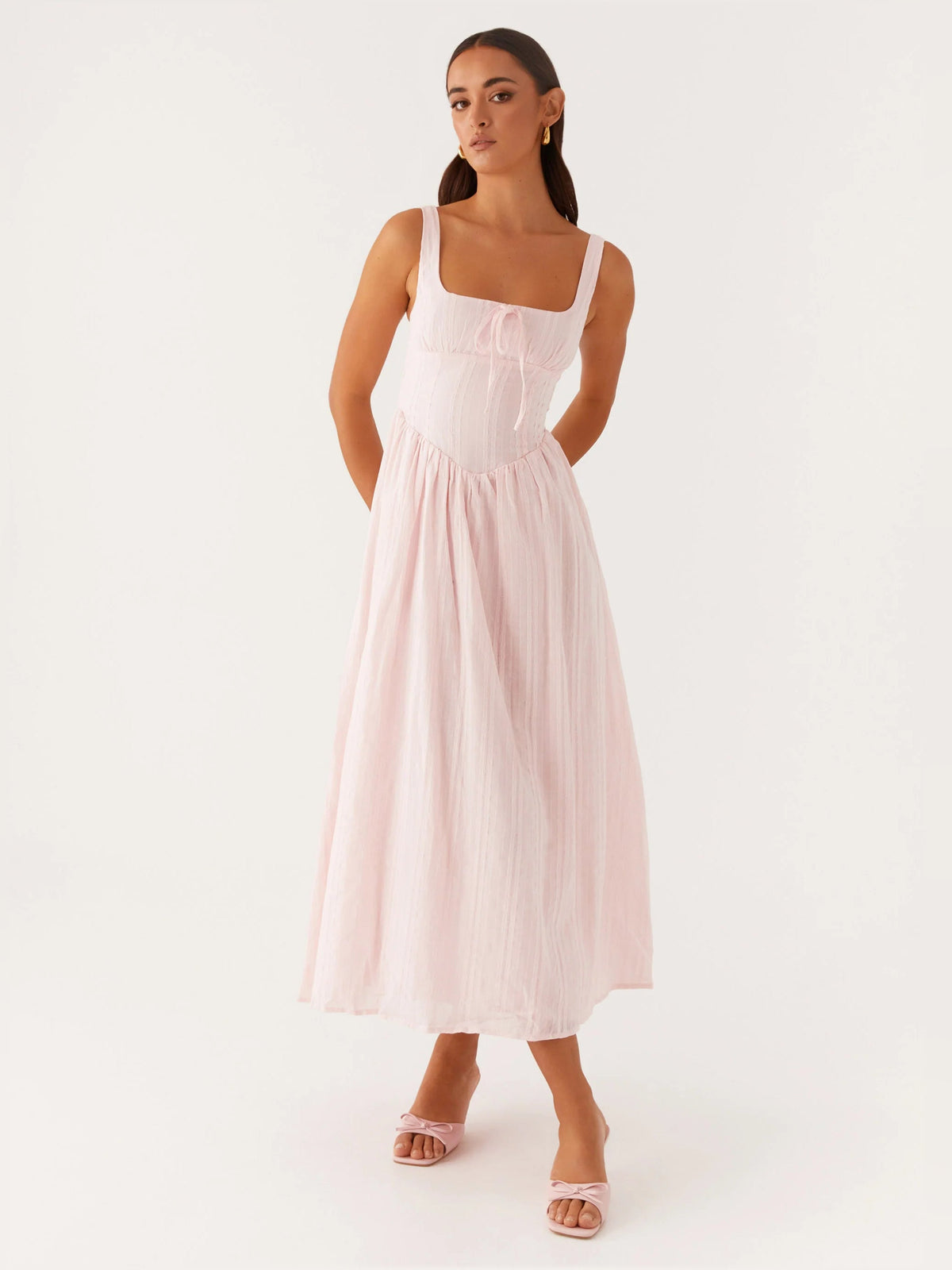 Pink midi formal dress with square neckline, sleeveless straps, smocked bodice