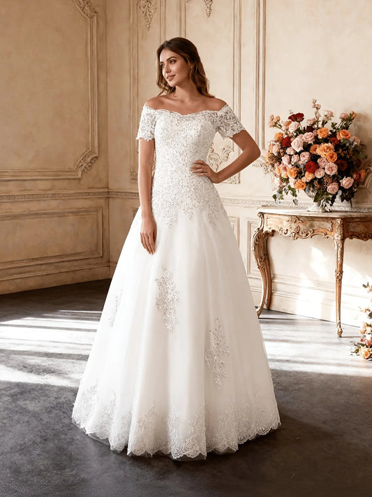 Ivory off-shoulder ball gown wedding dress with floral lace and short sleeves