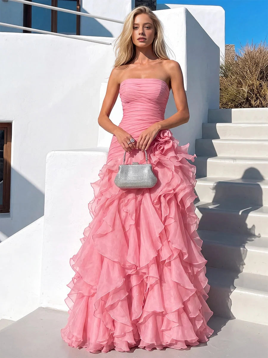 Light pink strapless ruched chiffon prom dress with tiered ruffled A-line skirt
