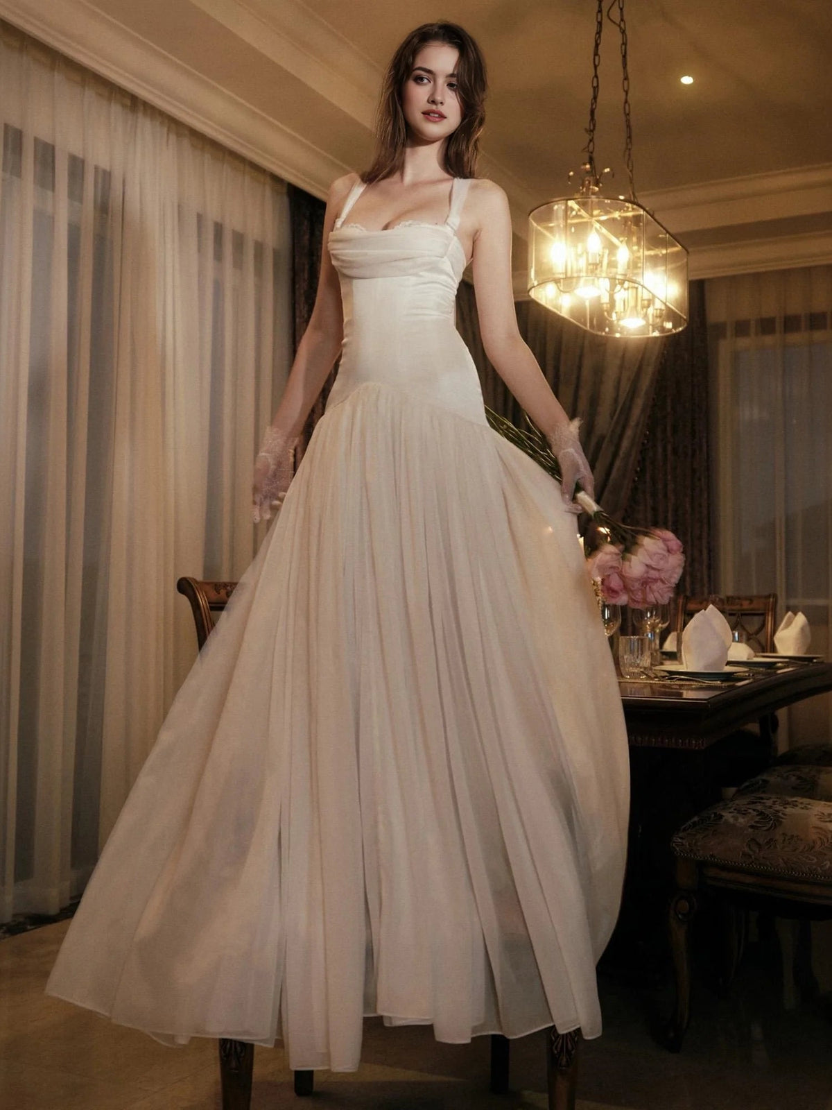 Ivory A-line wedding dress with square neckline, draped bodice, lace trim, full skirt