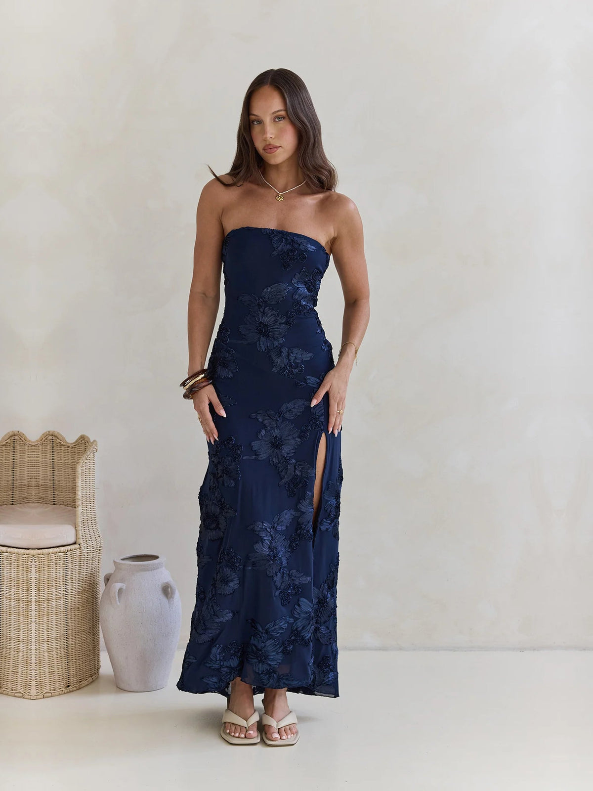 Navy sheath maxi formal dress with strapless neckline, full-length front view