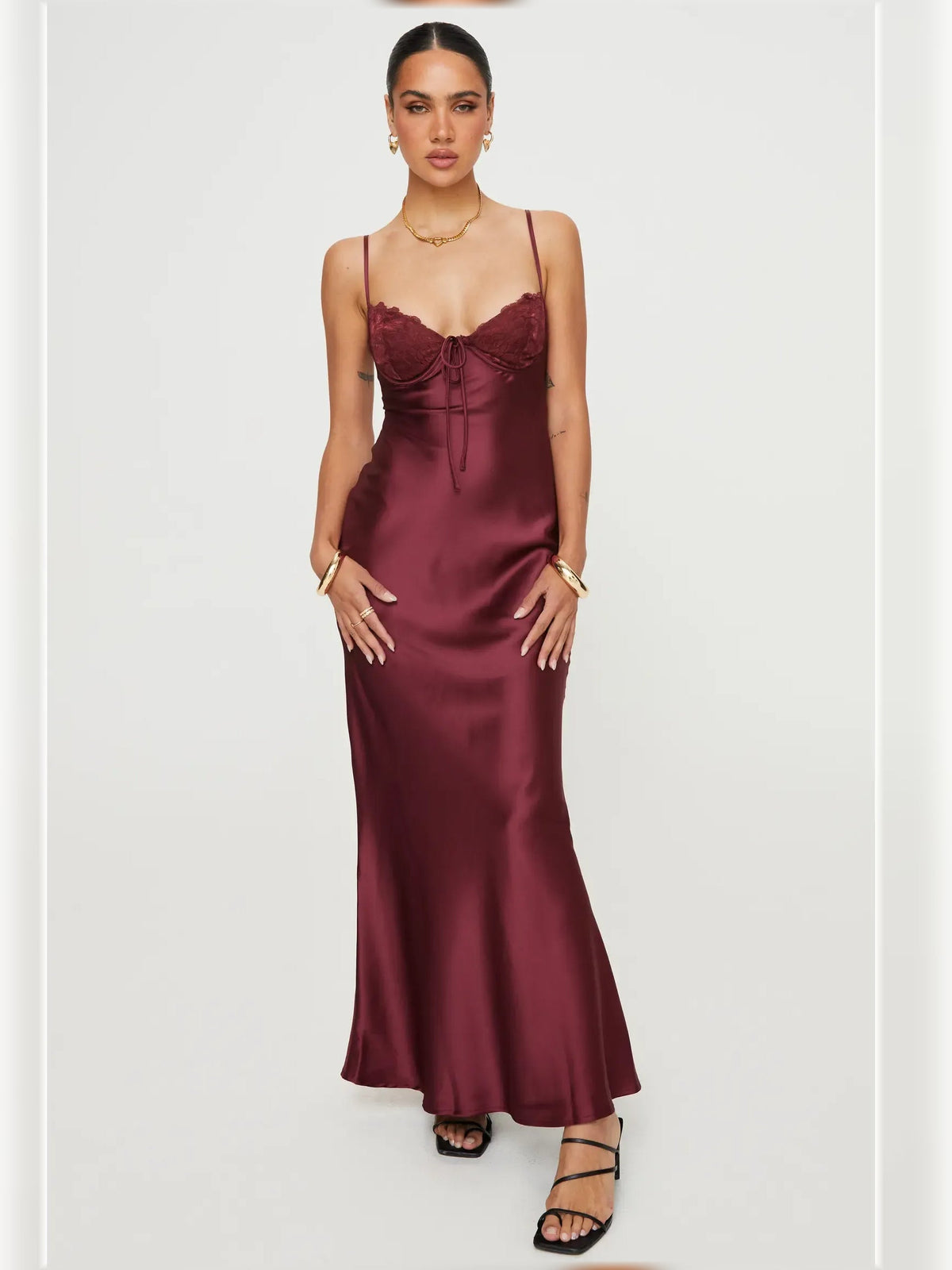 Dark red satin formal dress with sweetheart neckline, spaghetti straps, lace bust