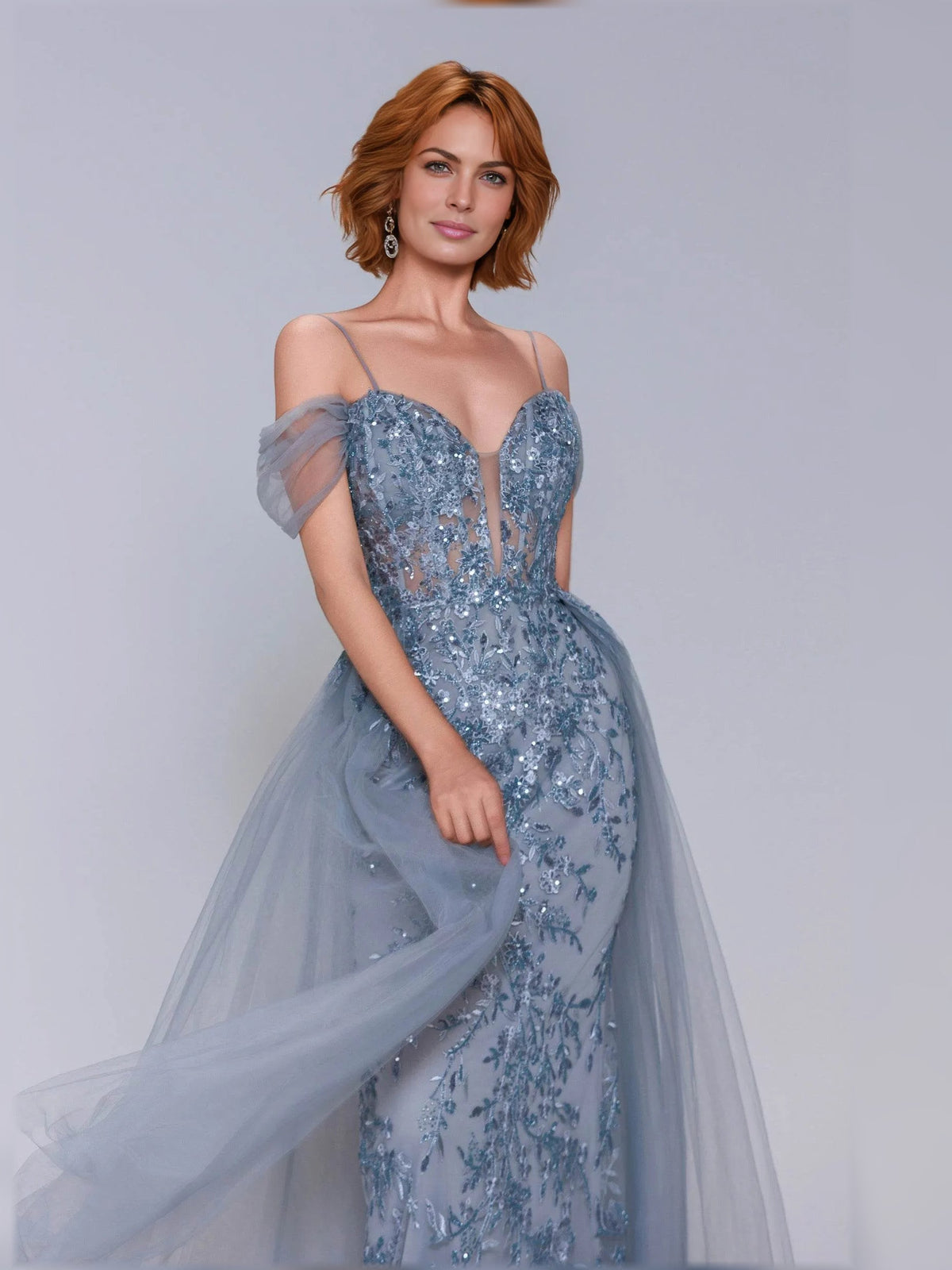 Dusty blue off-shoulder corset gown with sparkle sequin pattern and flowing tulle overlay