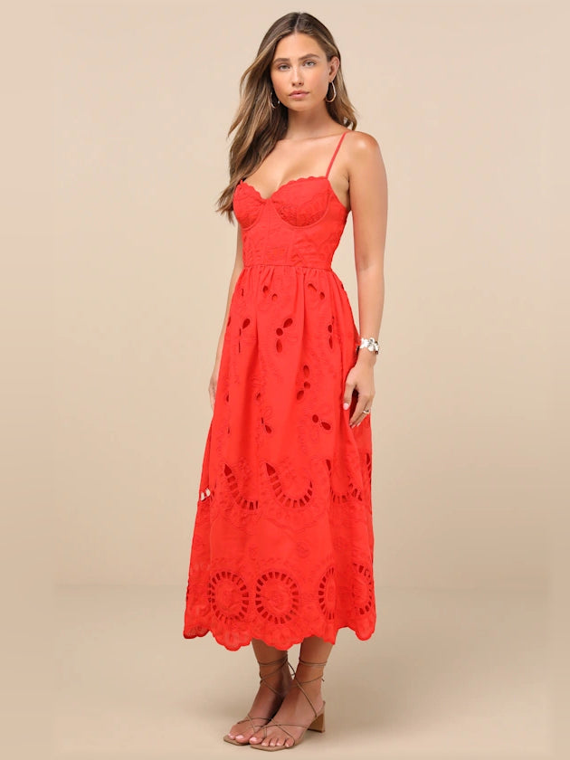 Red embroidered midi dress with bustier bodice, lace cutout pattern, spaghetti straps