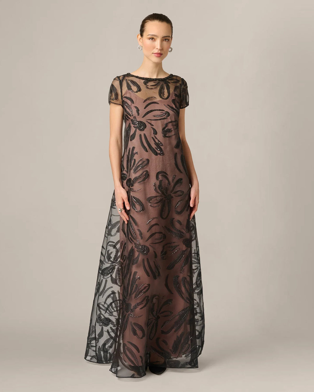 Black A-line maxi dress with short sleeves, floral embroidery on sheer fabric