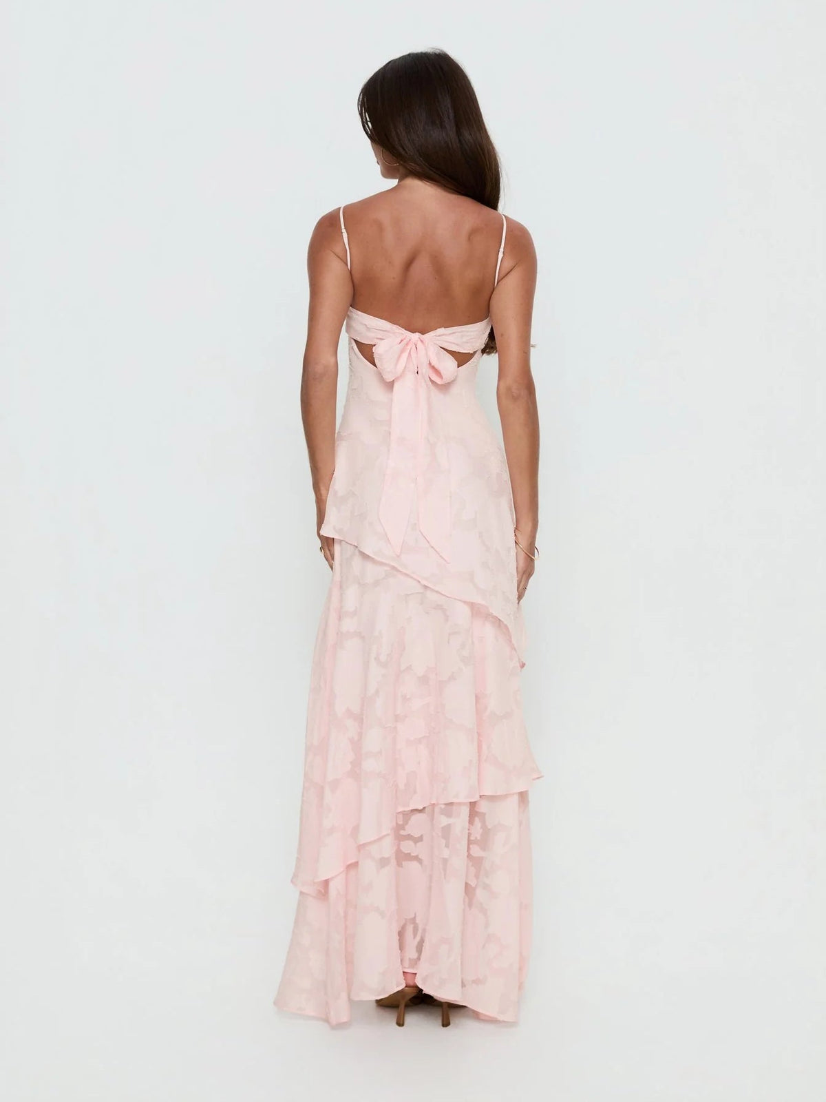 Pink a-line maxi formal dress with tiered skirt, full-length back view