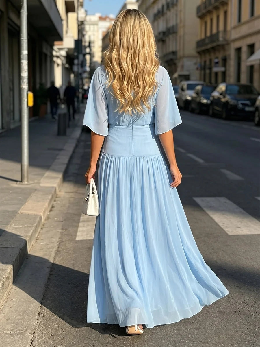 Sky blue chiffon A-line maxi dress with short sleeves, back view
