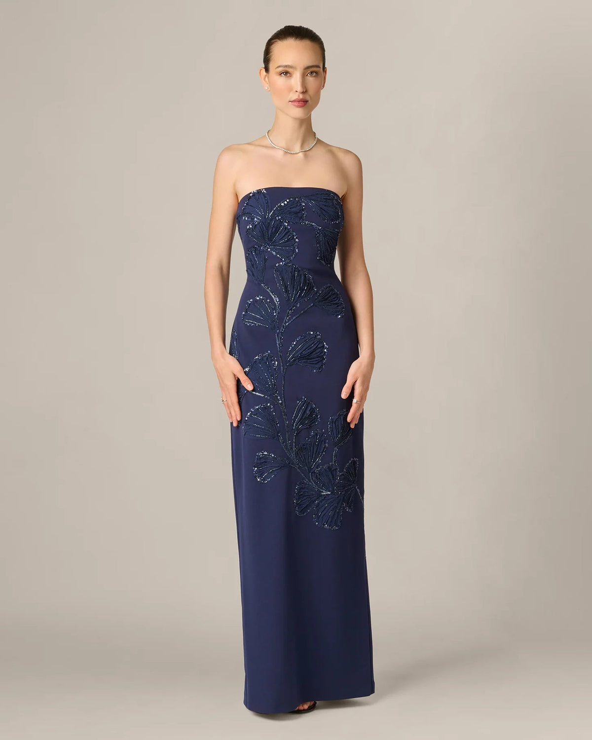 Dark navy strapless sheath maxi dress with floral beaded embroidery, fitted silhouette