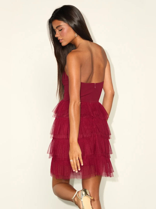 Wine-red strapless mini tulle dress with tiered ruffle skirt and fitted bodice (back view)