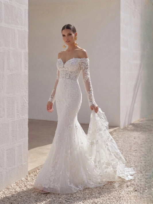 Ivory off-shoulder mermaid wedding dress with floral lace sleeves and scalloped tulle skirt