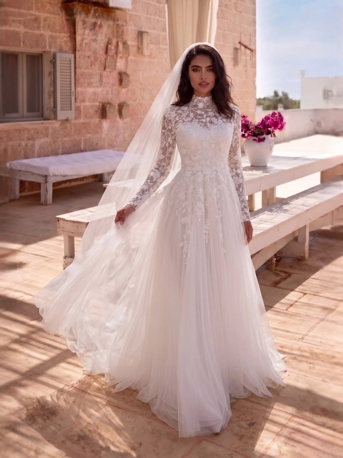 Ivory high-neck embroidered tulle A-line wedding dress with long sleeves and voluminous skirt