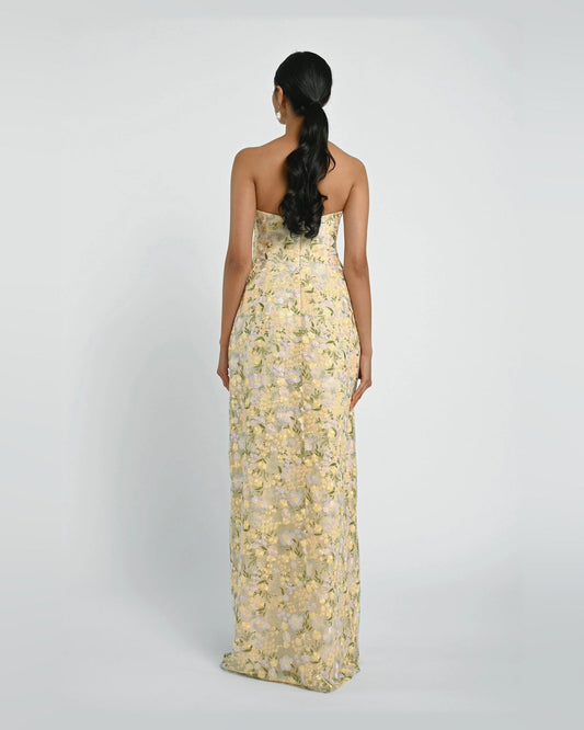 Yellow floral strapless A-line maxi dress, back view, side slit