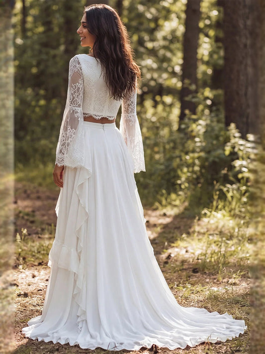 Ivory lace long-sleeve A-line wedding dress with bateau back and layered ruffle slit skirt