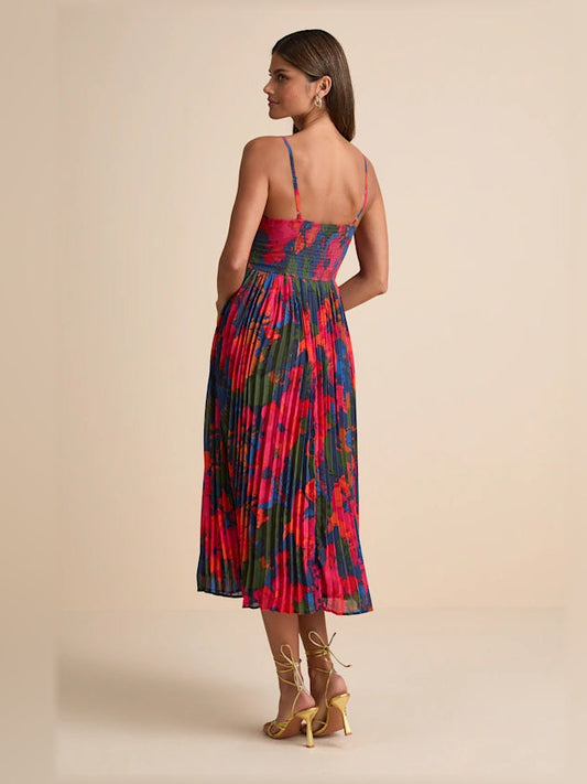 Back view of pleated midi formal dress, spaghetti straps, dark blue floral print