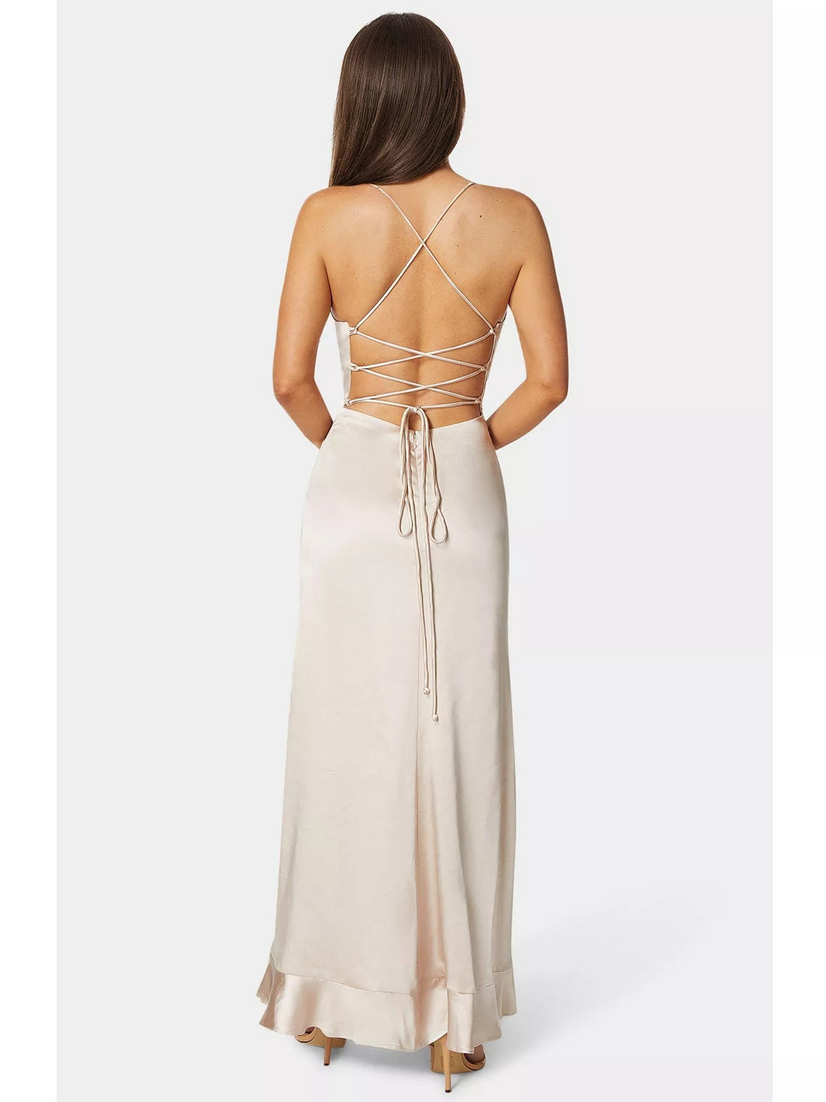 Back view: cream floor-length dress with crisscross lace-up straps and side slit