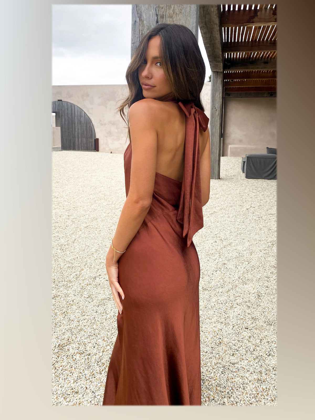 Rust midi formal dress, back full-length view showing the bodice