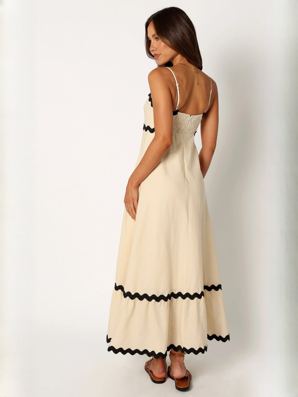Black a-line maxi formal dress with a-line, full-length back view