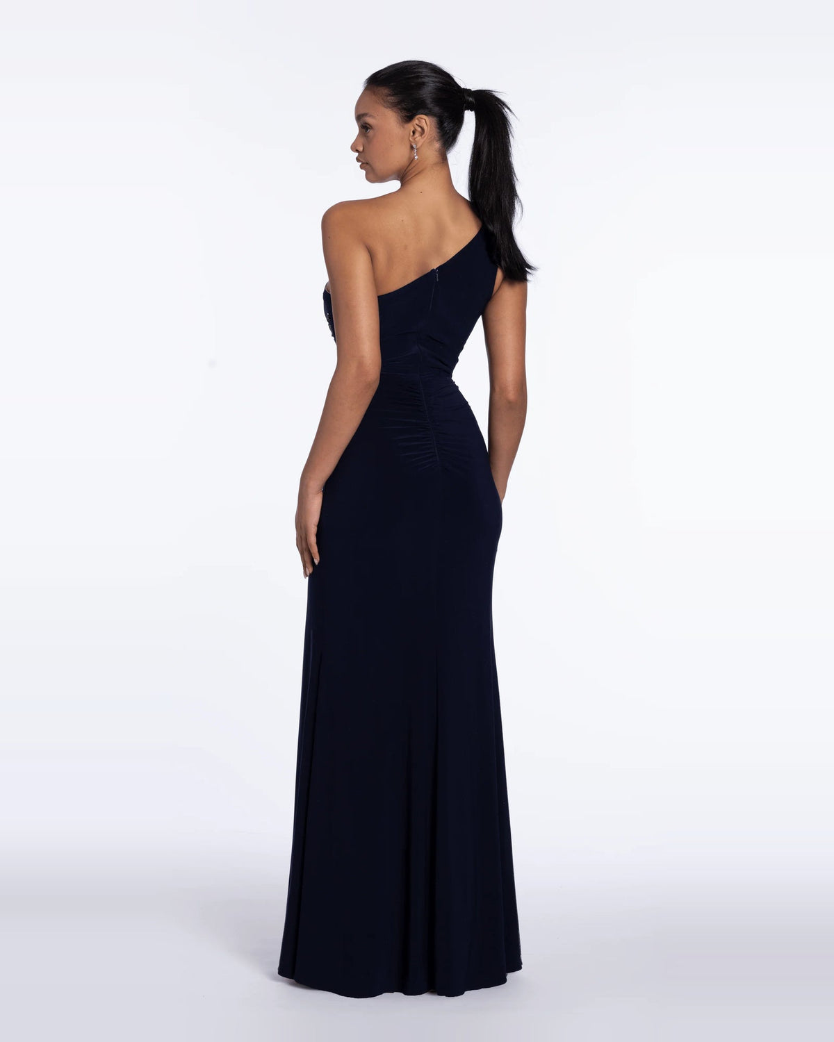 Navy one-shoulder column maxi dress, side view with embellished bodice and long slit