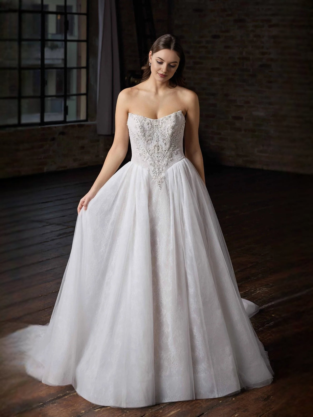 Ivory tulle A-line wedding dress with beaded sweetheart bodice, full front view
