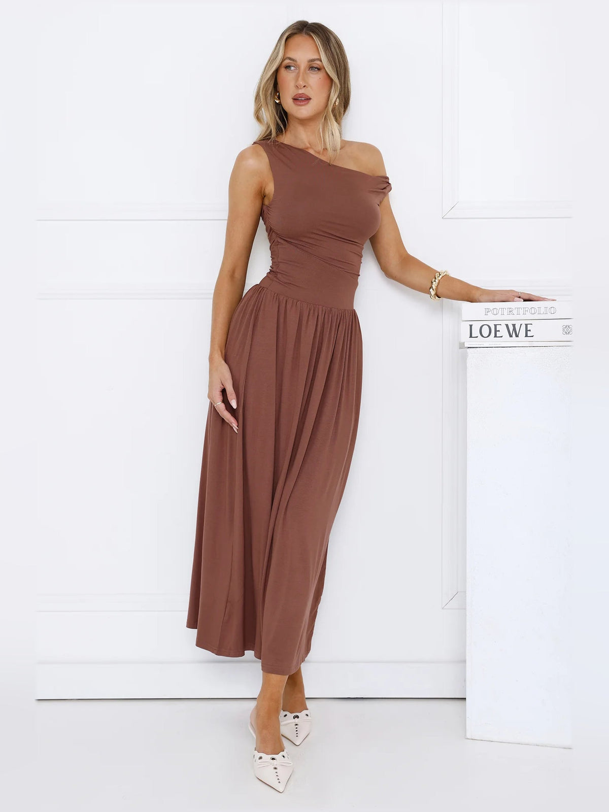 Brown off-shoulder midi dress, sleeveless with gathered waist and flowing skirt