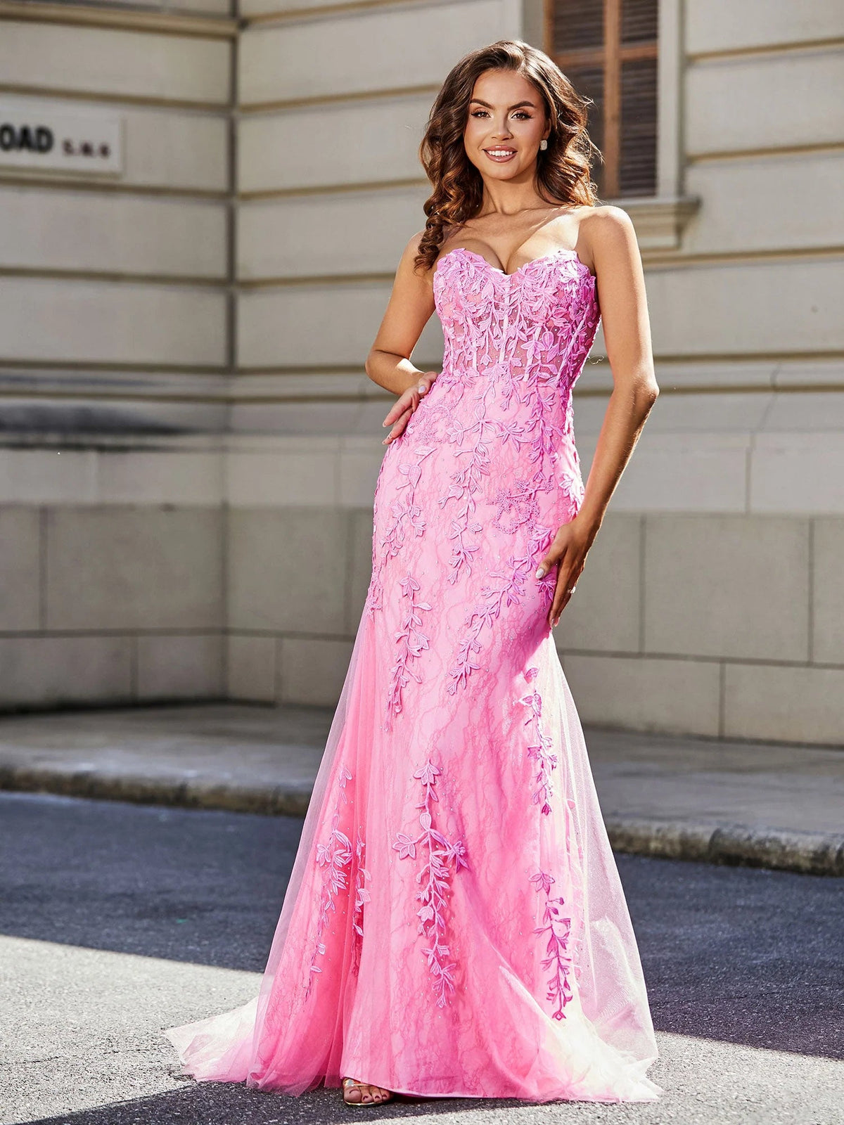 Pink corset sweetheart mermaid prom dress with floral lace bodice and long tulle skirt