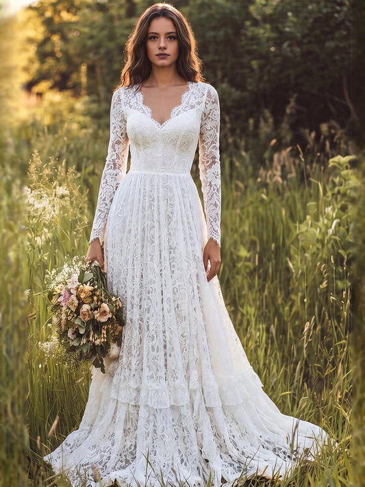 Ivory lace V-neck A-line wedding dress with long lace sleeves, tiered ruffle hem, floor length