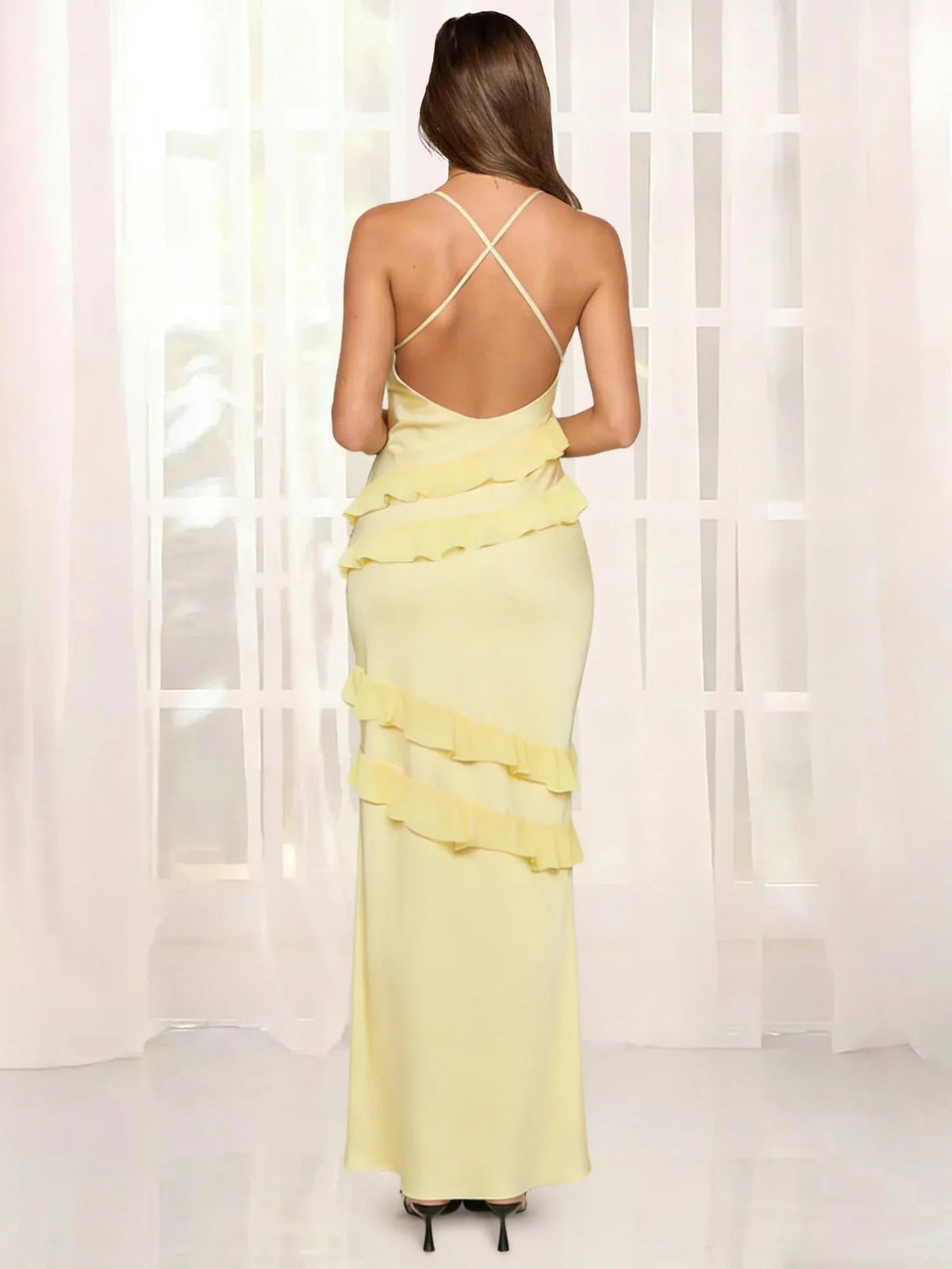 Yellow backless spaghetti strap formal dress with crisscross straps and ruffle tiers