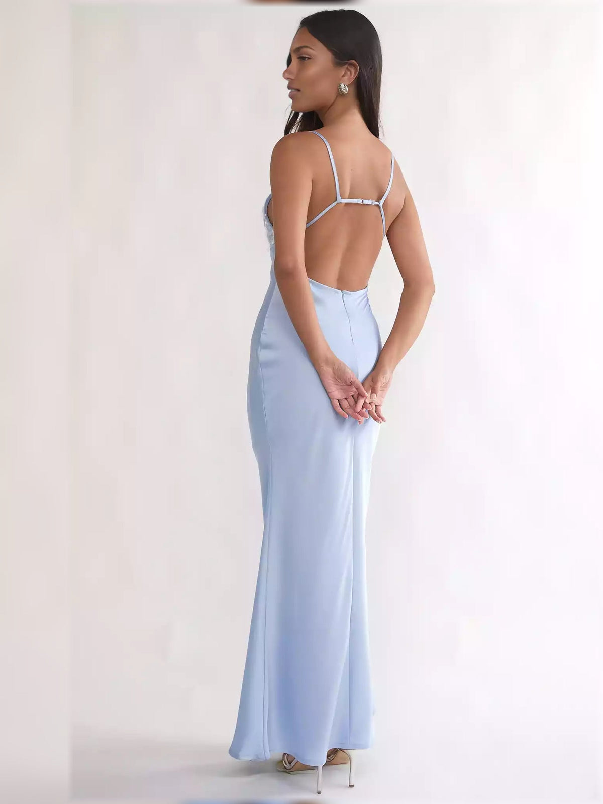 Light blue open-back formal dress with thin spaghetti straps and lace-sequin detail