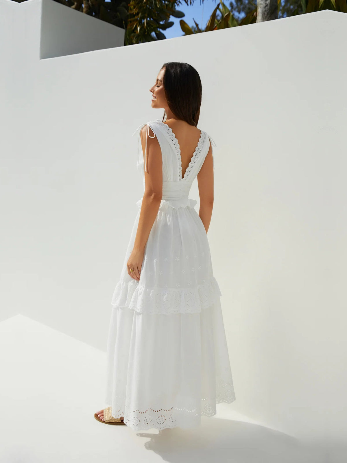 White a-line maxi formal dress with a-line, full-length back view