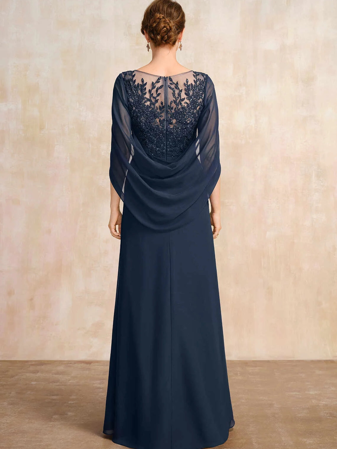 Dark blue chiffon A-line dress with illusion lace back and draped cape sleeves