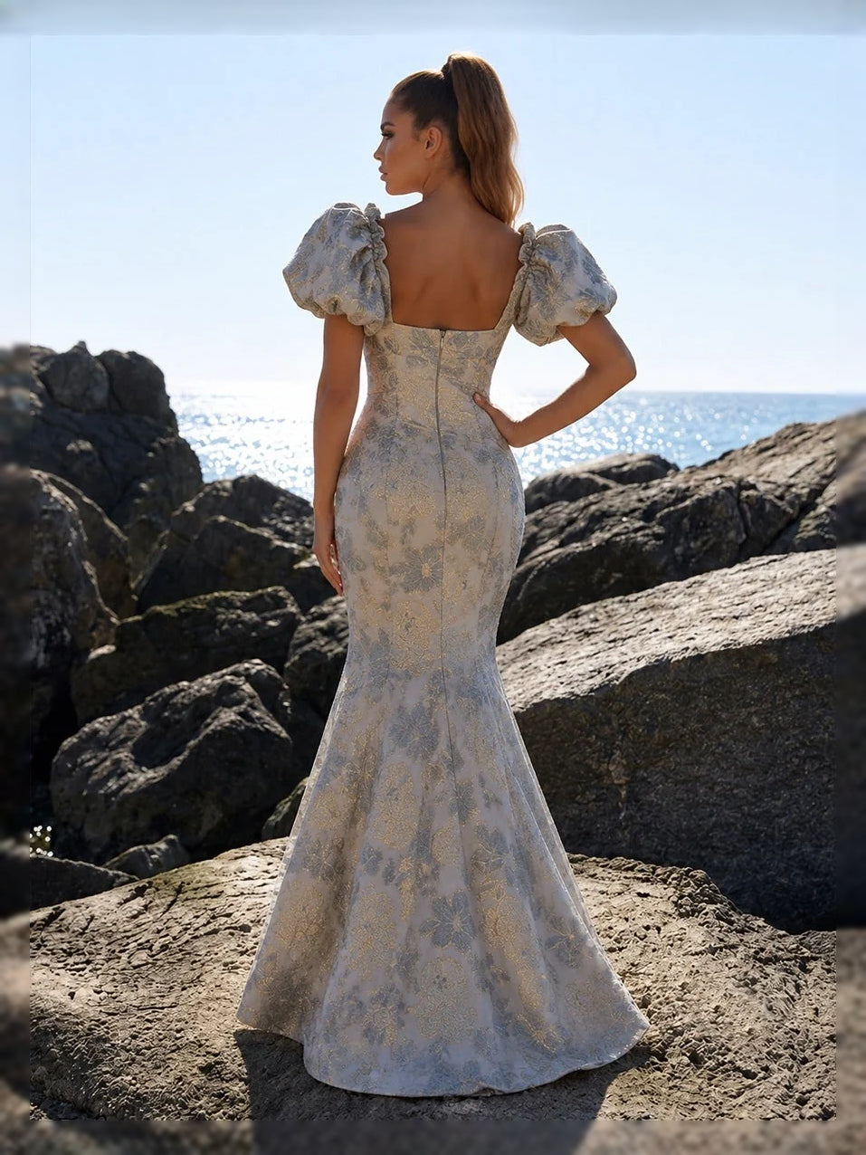 Dusty blue floral mermaid dress with puff sleeves, square back; side view