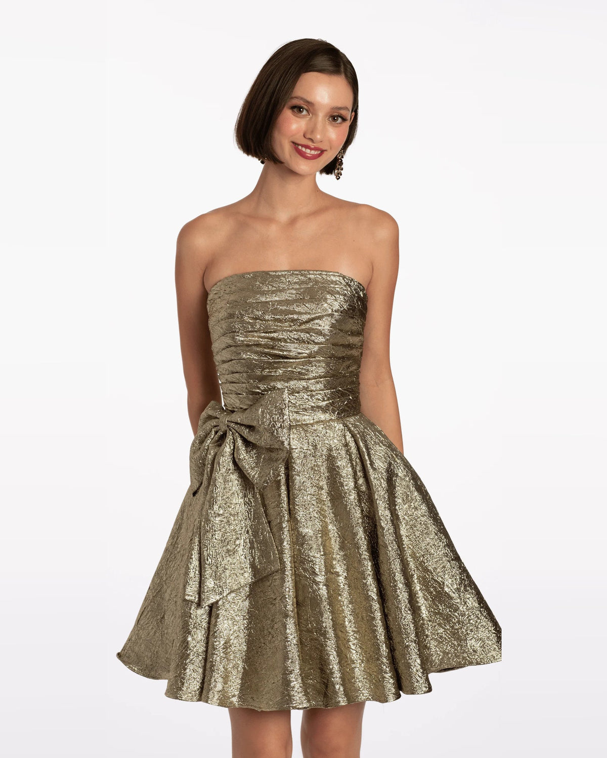 Gold strapless fit-and-flare dress with ruched bodice, pleated skirt, and bow waist