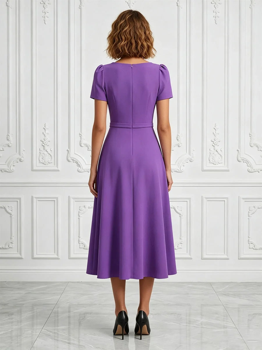 Back view purple V-neck midi A-line crepe dress, short sleeves, fitted waist
