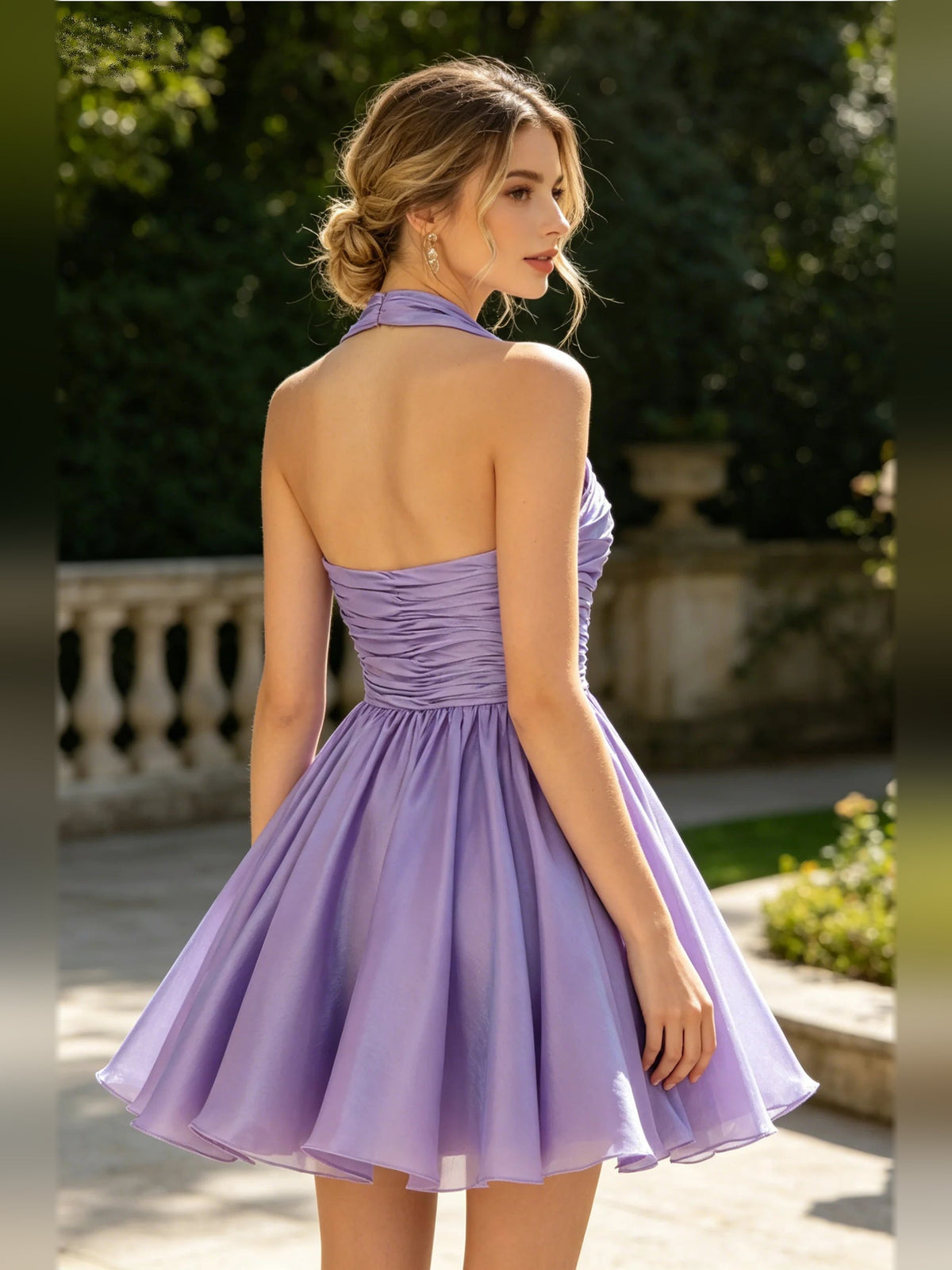 Lavender ruched halter A-line mini dress shown from the back with open halter neckline