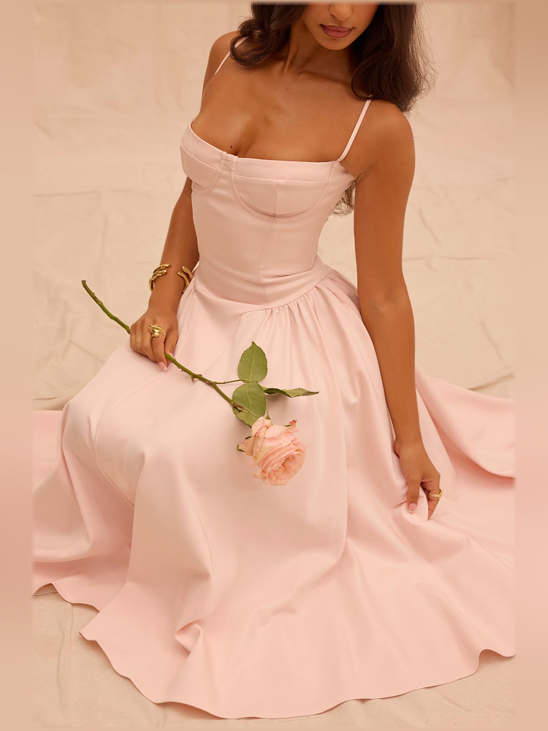 Pink corset midi dress with spaghetti straps and gathered waist pleats